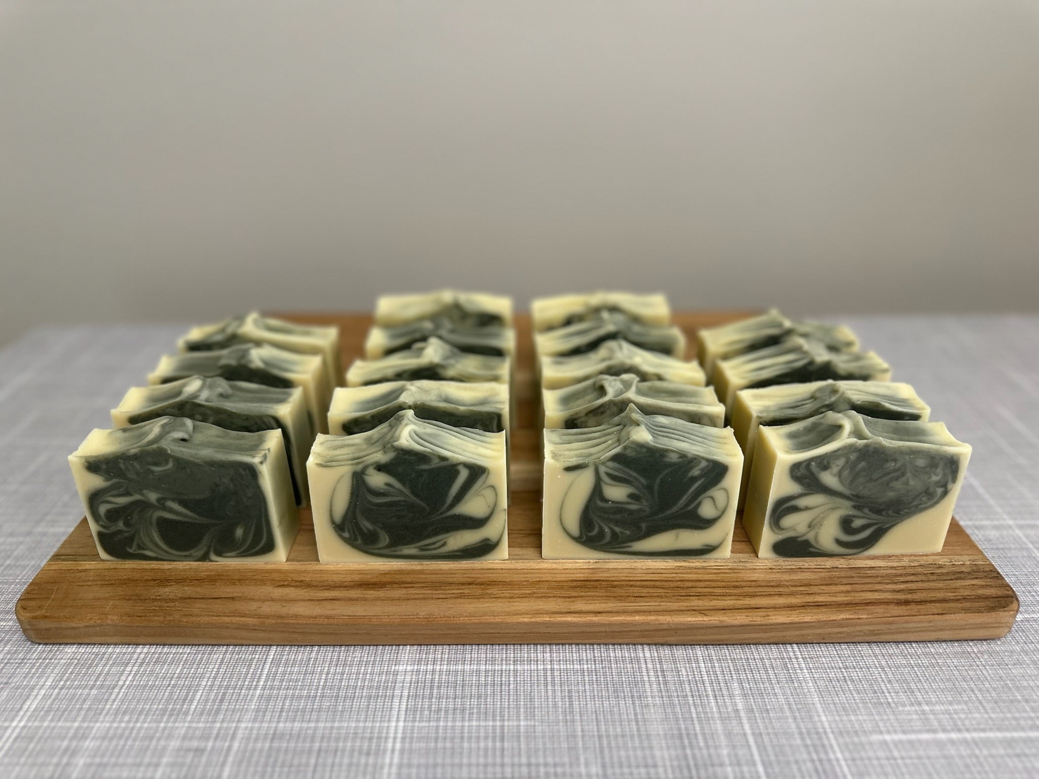 Mint Revival handmade soap bar with visible mint leaf accents – natural moisturizing artisan soap.