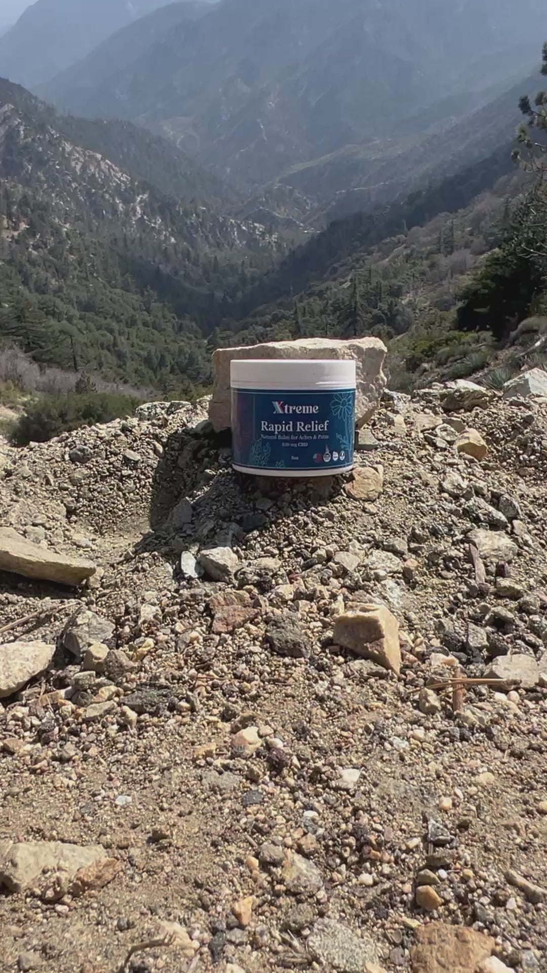 Xtreme Rapid Relief Natural Balm outdoors in the mountains – USA-made, doctor-trusted hemp-derived CBD formula with Arnica, Turmeric, and Willow Bark for everyday muscle and joint relief.