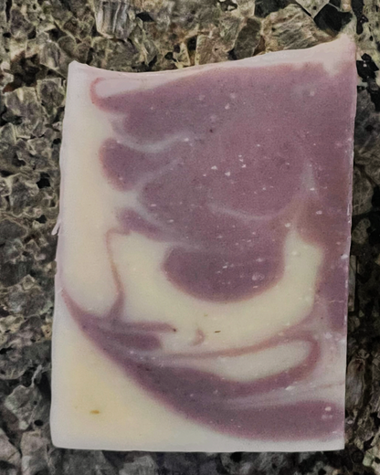Close-up of Lavender Dream handmade soap bar – natural artisan bar with lavender buds for a calming, aromatic cleanse.
