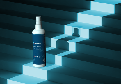Bottle of Xtreme Rapid Relief Natural Spray resting on stairs USA-made natural spray for muscle and joint comfort wherever you go