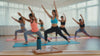 Xtreme Brands RX Rapid Relief Balm in focus with people doing yoga in the background – strongest doctor-trusted formula with full-spectrum hemp, Arnica, and Menthol for targeted pain relief.
